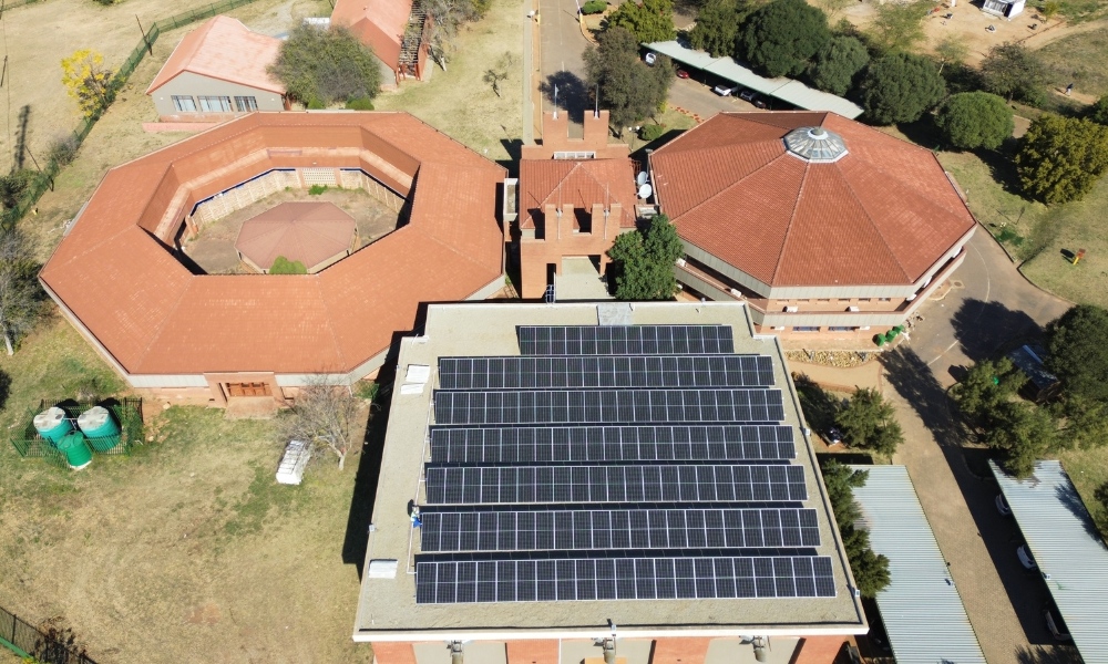image of solar panels on a roof of a data centre.